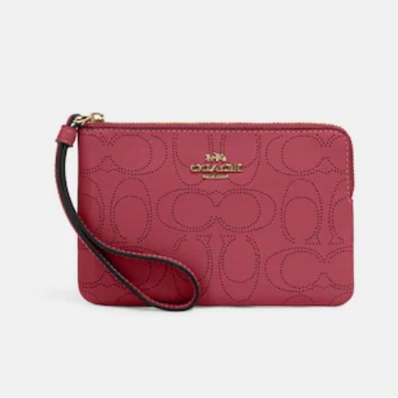 Coach Handbags - Burgundy signature coach wristlet